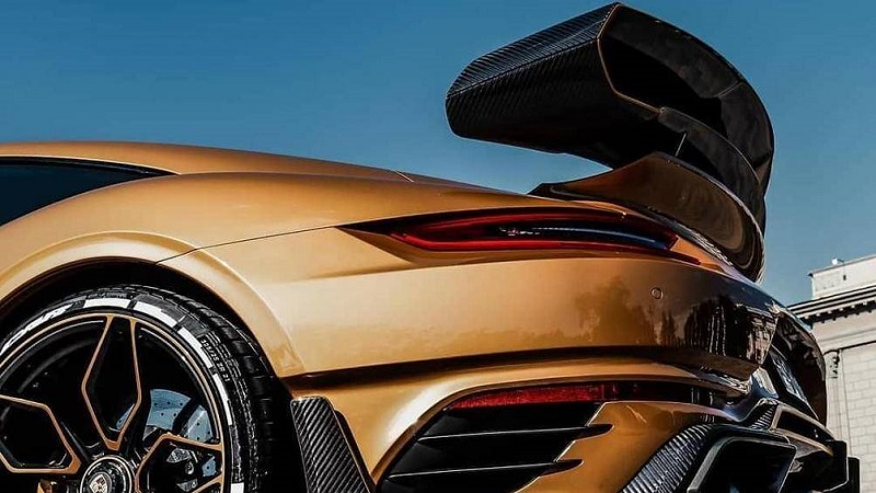 Xe sang Porsche "độ" chịu nhiệt tới 120 độ C, dát vàng 5 Porsche 911 Turbo Cabrio màu vàng